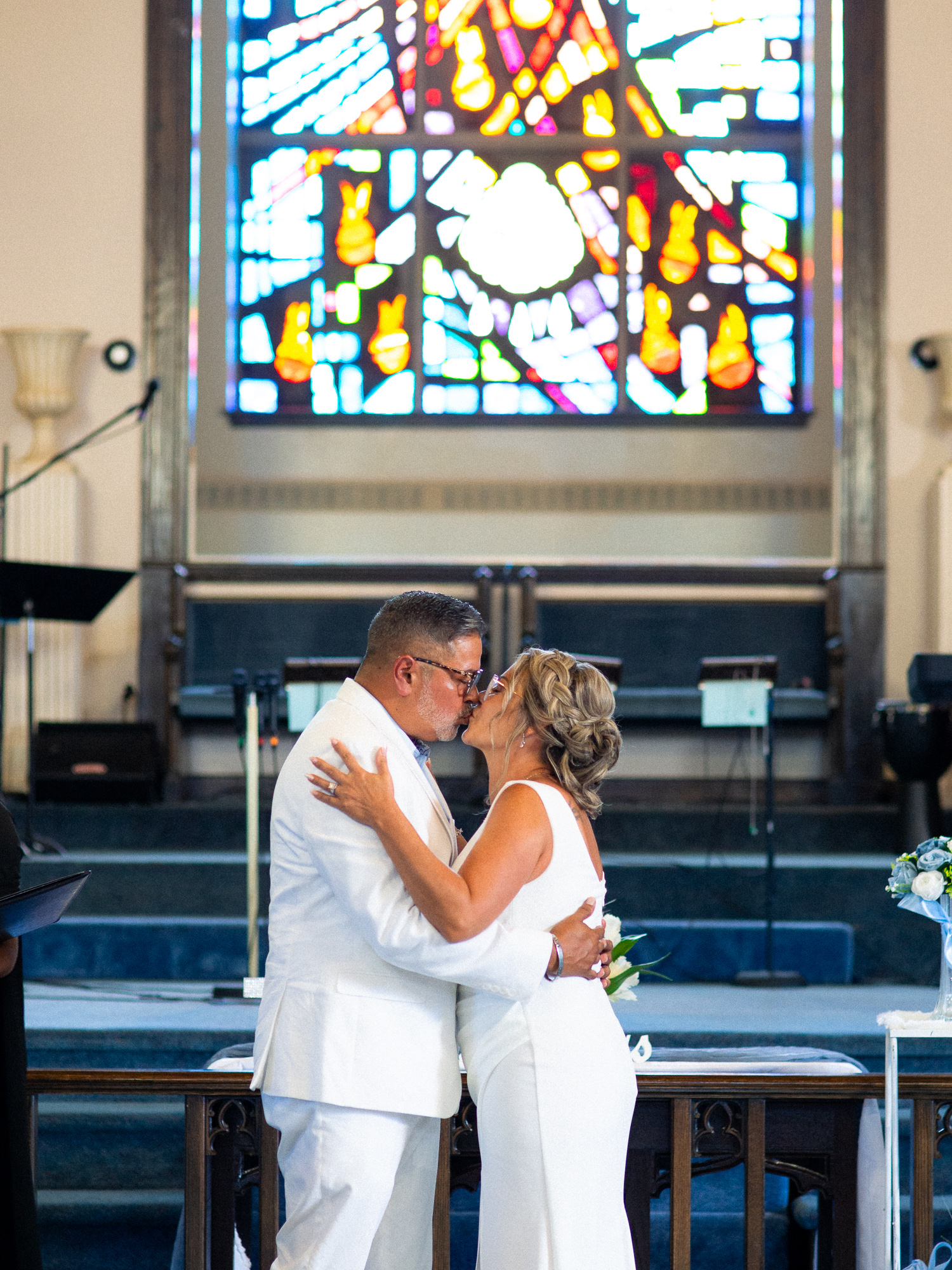 bride and groom first kiss