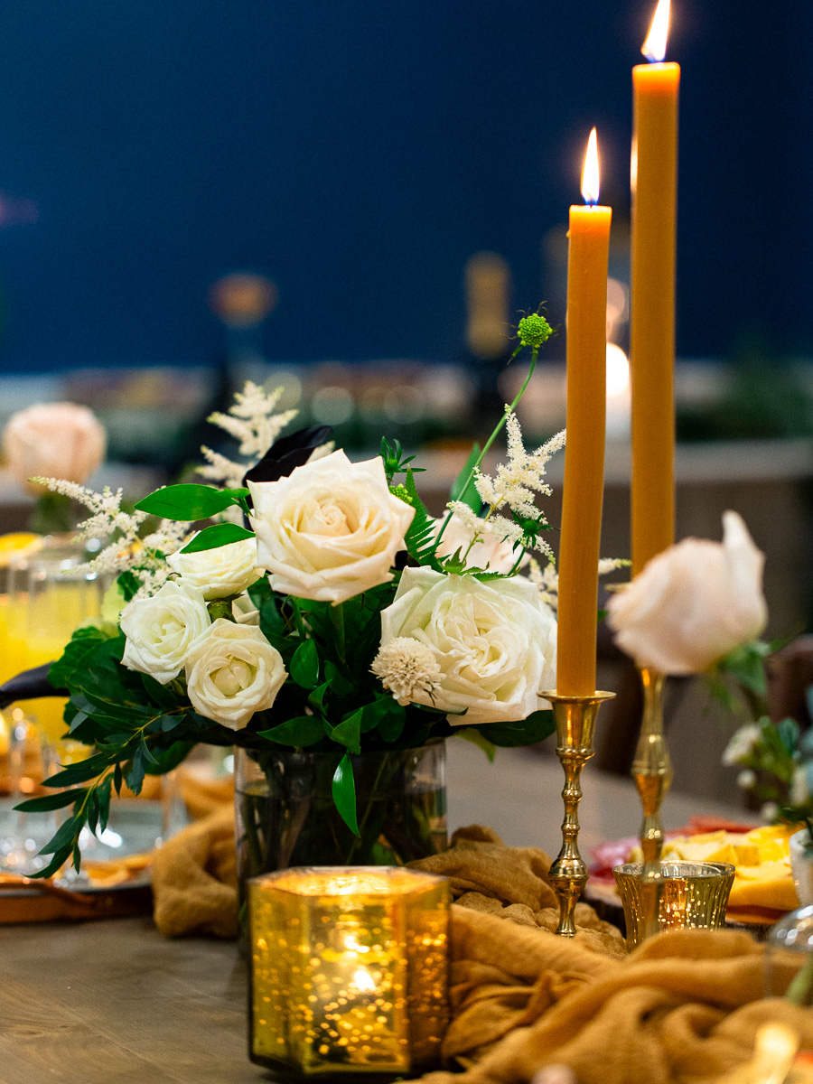 Close up of table details including flowers and candles