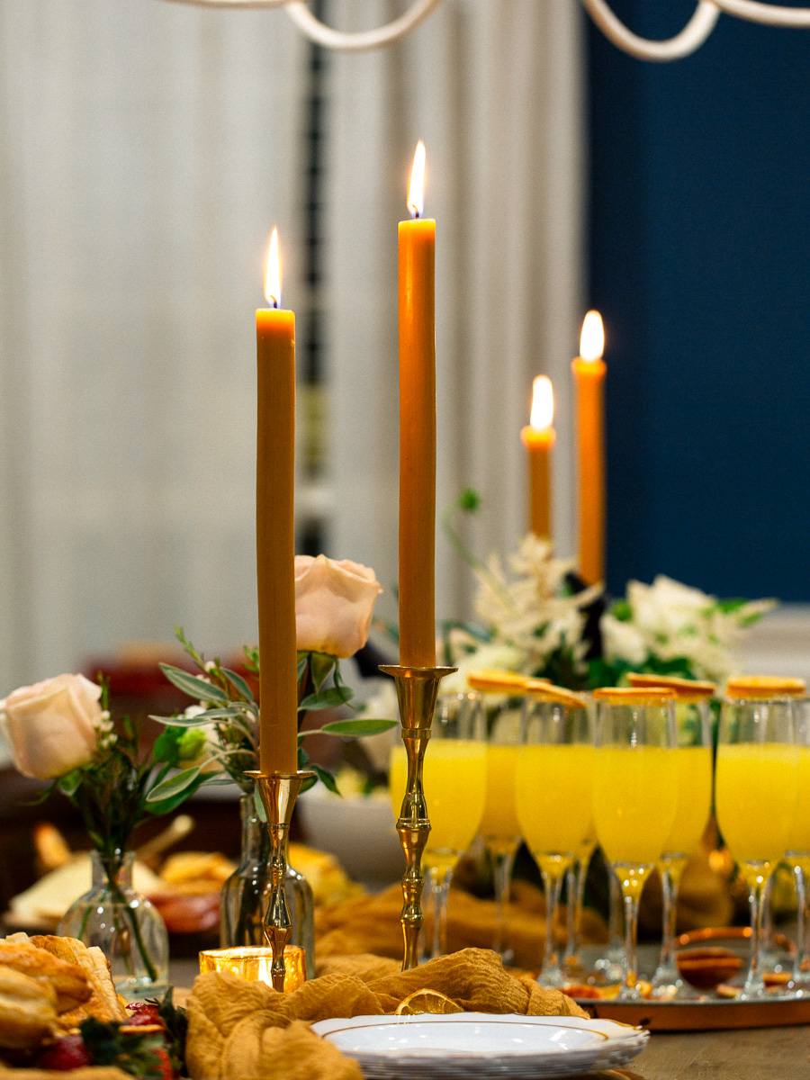 Close up of table details including candles and flowers