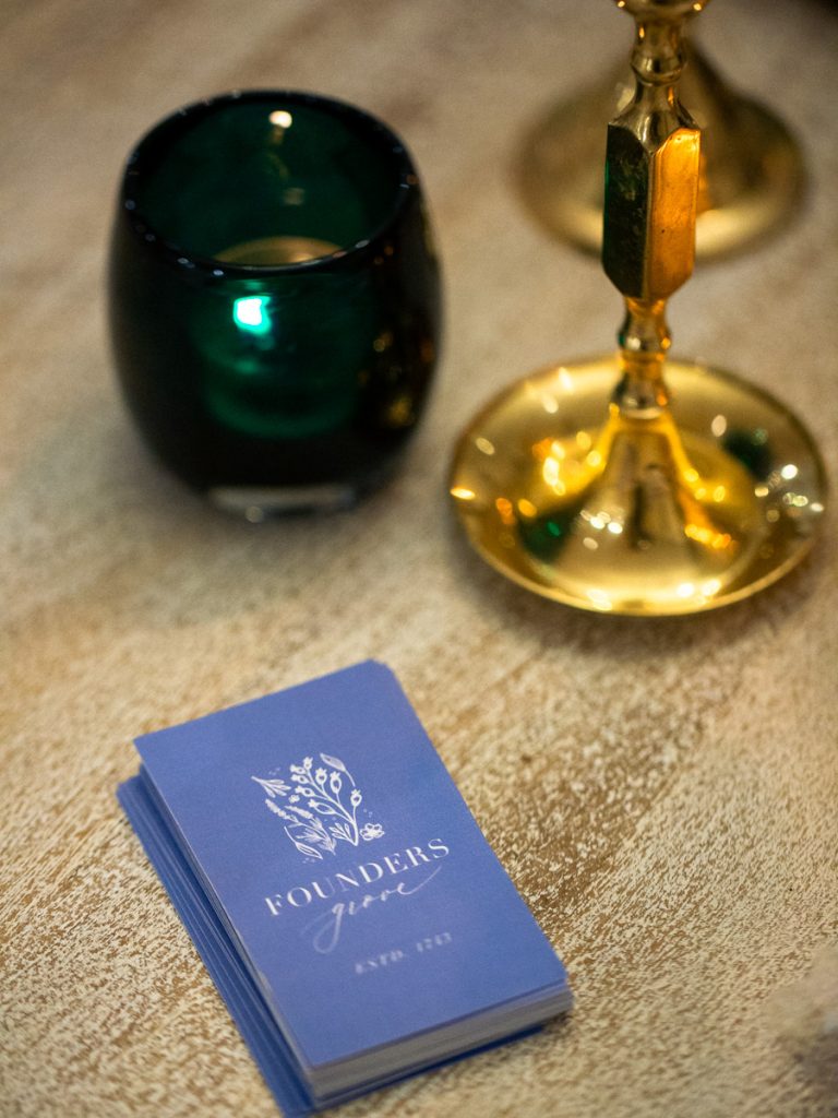 Close up of business card and candle