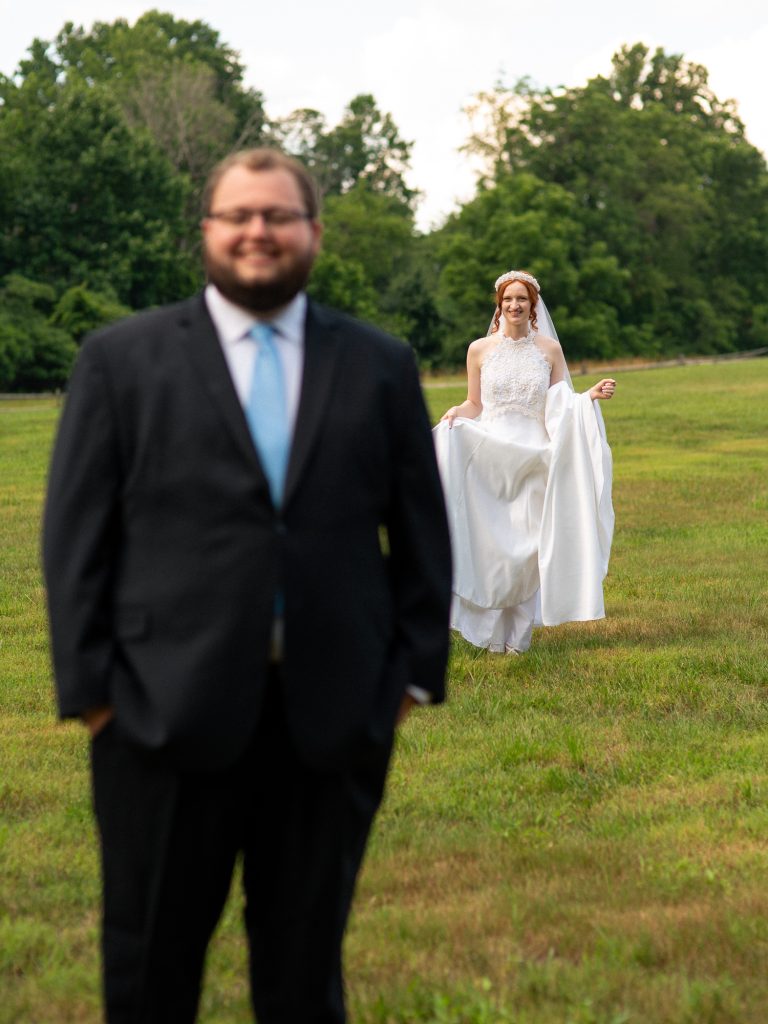 first look photo of bride and groom