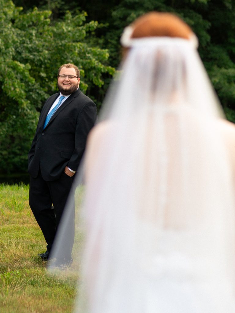 first look photo of bride and groom