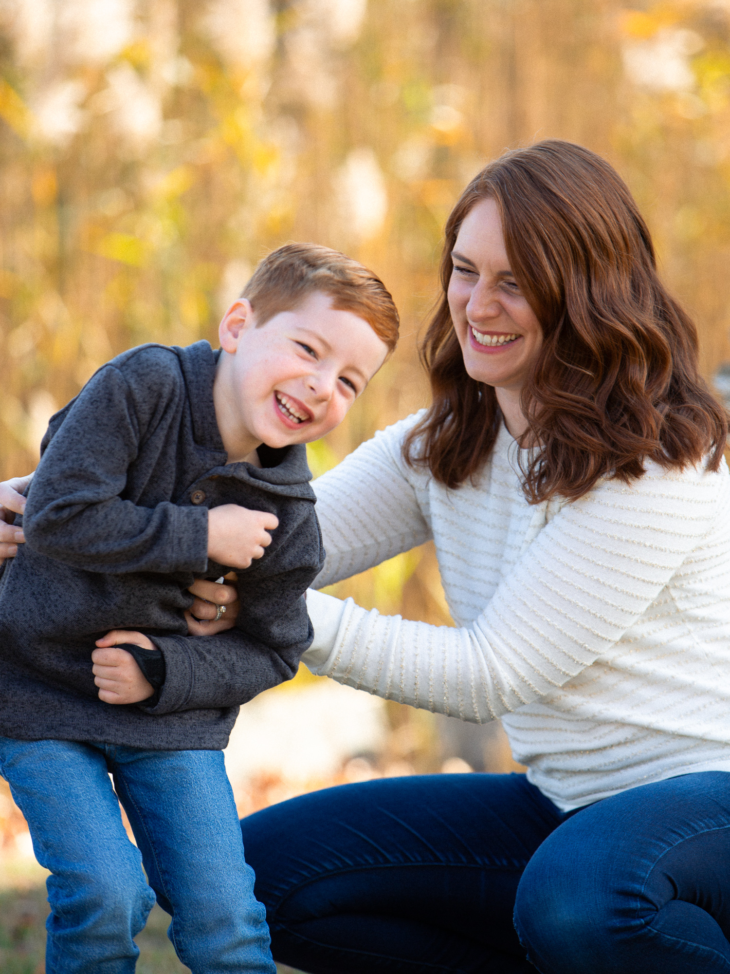 mom and son laughing
