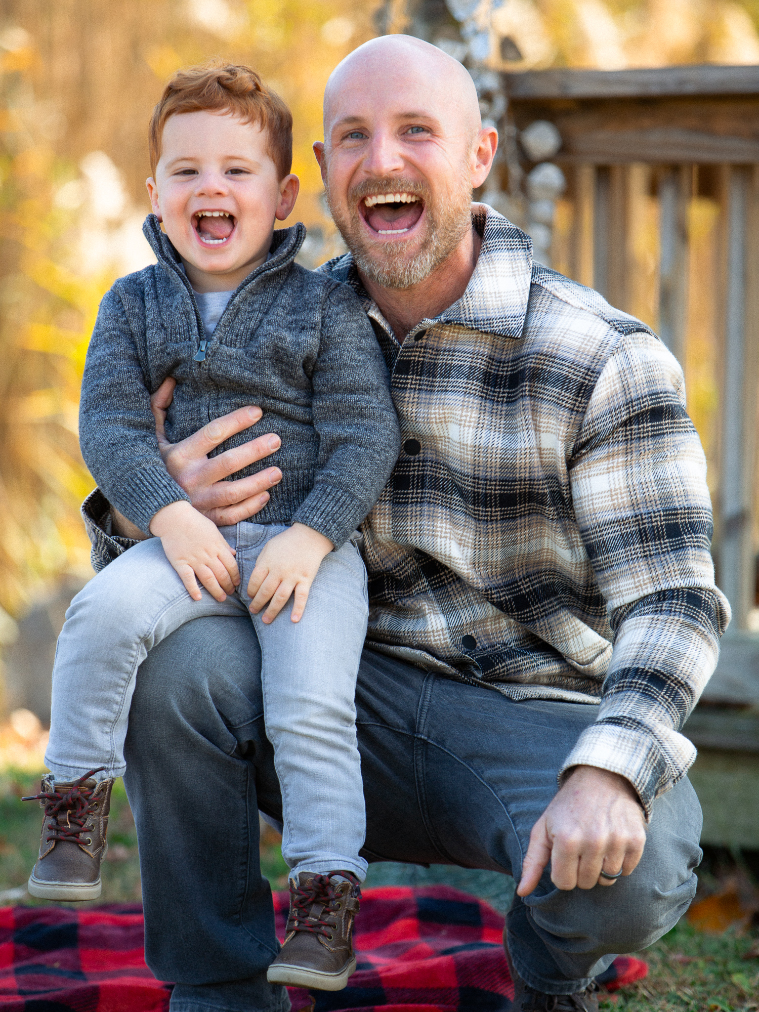 dad and son making a funny face