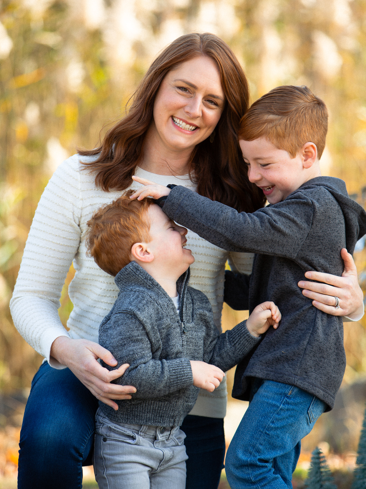 mom and boys laughing